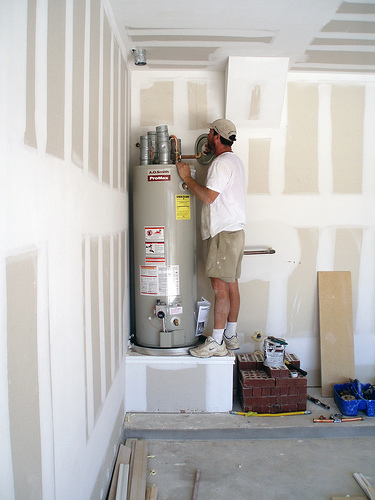 one of our San Leandro plumbers installs A.O. Smith water heater